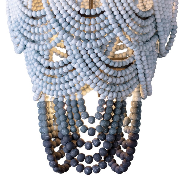 The draped wooden beads of a wood beaded chandelier